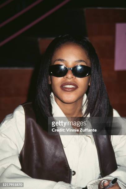 American singer and actress Aaliyah attends a press conference as Lifebeat's Counter AID announces its third annual fund-raiser, in Los Angeles,...