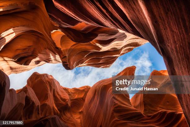 light coming through to the antelope canyon - midday stock pictures, royalty-free photos & images