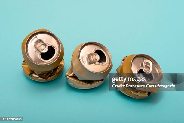 twisted beer cans - crushed tin stock pictures, royalty-free photos & images