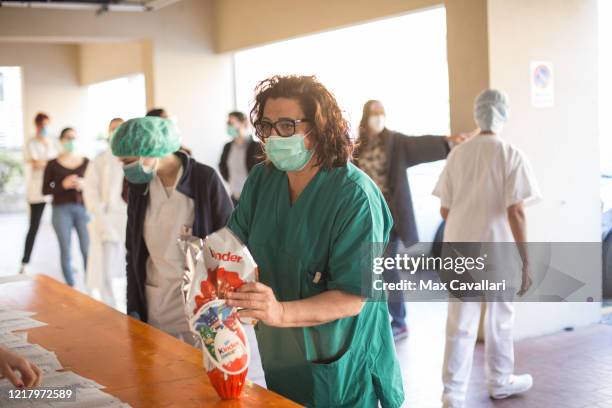 Sant'Orsola Hospital's team, in partnership with Ferrero, distribute chocolate eggs for Easter to all employees including doctors, nurses and medical...