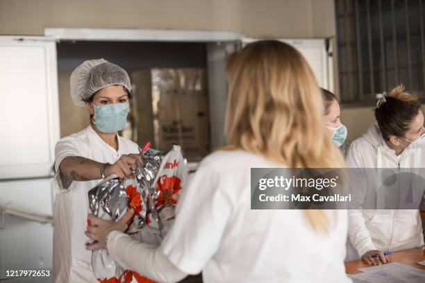 Sant'Orsola Hospital's team, in partnership with Ferrero, distribute chocolate eggs for Easter to all employees including doctors, nurses and medical...