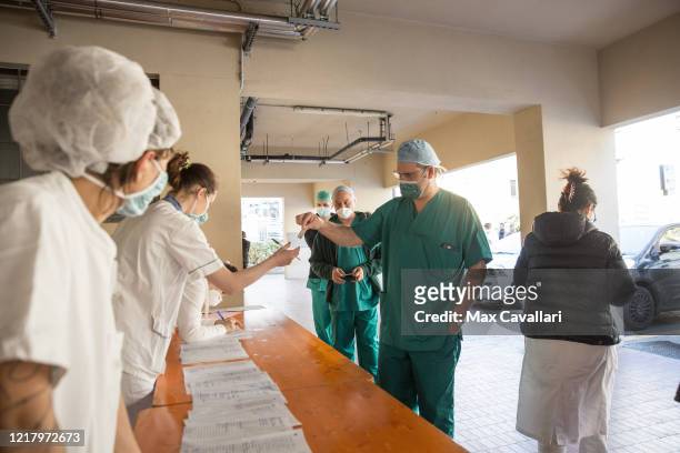 Sant'Orsola Hospital's team, in partnership with Ferrero, distribute chocolate eggs for Easter to all employees including doctors, nurses and medical...