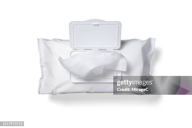 a bag of disposable disinfection wet wipe on white - baby wipes stock pictures, royalty-free photos & images