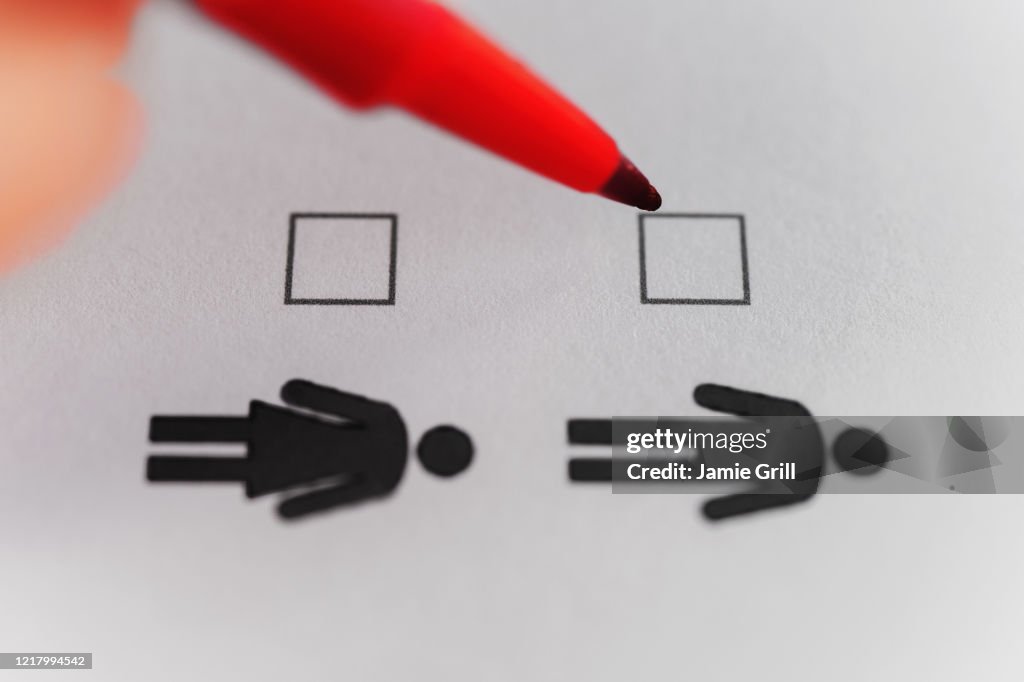 Gender Checking Person Marking With Pen On Male And Female Gender Checklist High-Res ...
