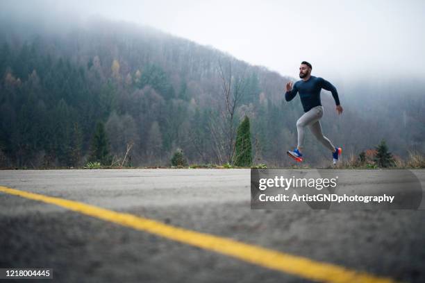 athlete training outdoor. - finishing line stock pictures, royalty-free photos & images