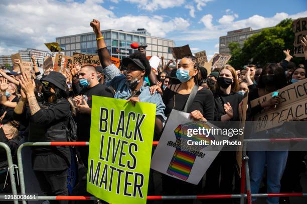 People protest against racism and police brutality and pay tribute to George Floyd in Alexanderplatz in Berlin, Germany on June 06, 2020. About...