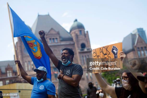 Protesters chant on the lawn of Queen's Park during an anti-racism march on June 6, 2020 in Toronto, Canada. This is the 12th day of protests since...