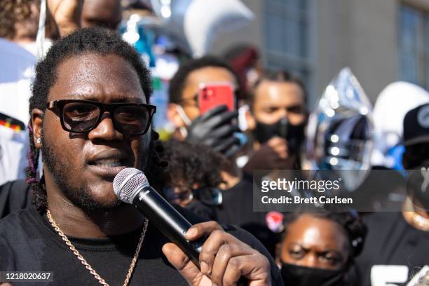 Jamon Brown of the Atlanta Falcons delivers remarks during a vigil for Breonna Taylor on June 6, 2020 in Louisville, Kentucky. This is the 12th day...