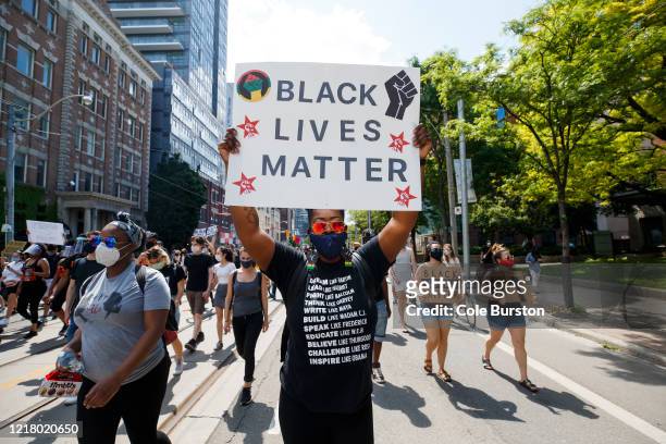 Protesters march during an anti-racism march on June 6, 2020 in Toronto, Canada. This is the 12th day of protests since George Floyd died in...