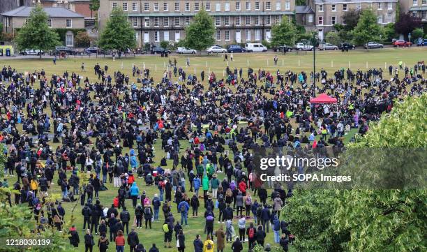 View down onto some of the crowd attending the demonstration. Around 5000 People gathered in Cambridge, to hold a peaceful demonstration as part of a...