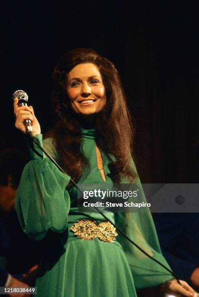 American Country singer Loretta Lynn performs onstage at an unspecified event, New York, 1963.