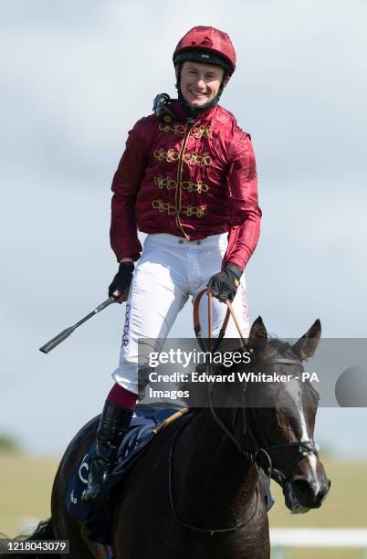 Kameko ridden by Oisin Murphy wins the Qipco 2000 Guineas at Newmarket Racecourse.