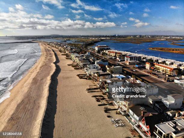 aerial view of a deserted beach at surf side, sunset beach area close to sunset - huntington beach stock pictures, royalty-free photos & images