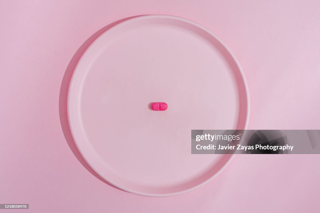 Fuchsia On A Pink Plate