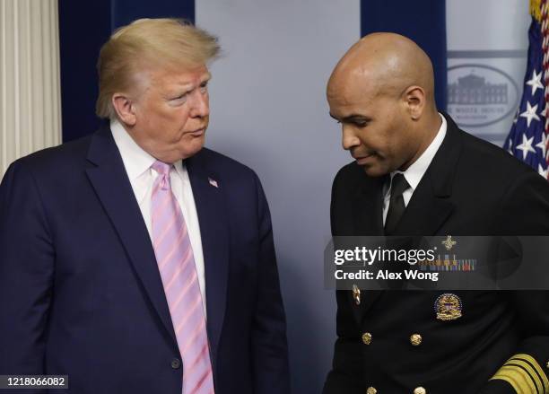 President Donald Trump and U.S. Surgeon General Jerome Adams participate in the daily briefing of the White House Coronavirus Task Force in the James...