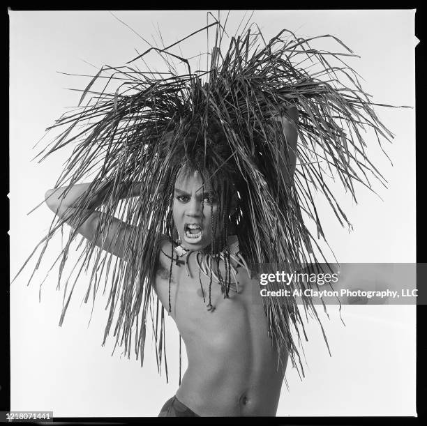 RuPaul Andre Charles holds a grass skirt over his head taken as part of the Club Kids collection in 1987 in Atlanta, Georgia.