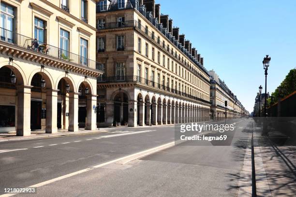 paris : rivoli street is empty during pandemic covid 19 in europe - intercontinental paris grand stock pictures, royalty-free photos & images