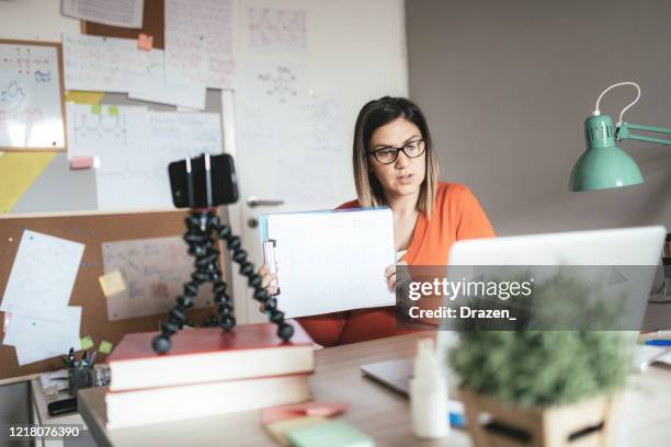professor and students in virtual class during pandemic coronavirus - e learning teacher stock pictures, royalty-free photos & images