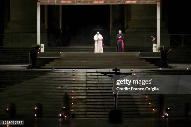 Pope Francis attends the Stations of the Cross in an empty St. Peter's Square due coronavirus pandemic on April 10, 2020 in Vatican City, Vatican....