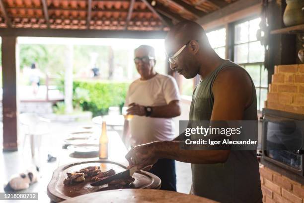 brazilian barbecue - fathers day dinner stock pictures, royalty-free photos & images