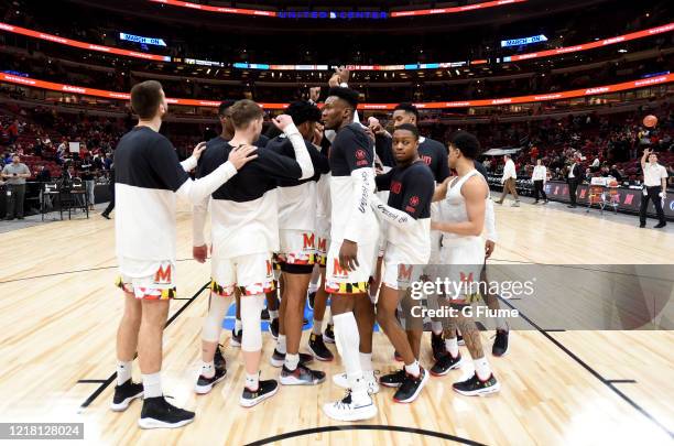 The Maryland Terrapins huddle up against the Nebraska Cornhuskers in the Second Round of the Big Ten Basketball Tournament at United Center on March...