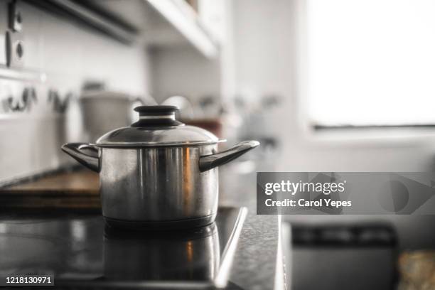 pot on the kitchen - electric stove burner stock pictures, royalty-free photos & images