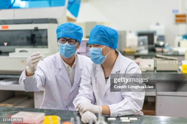 Lab Testing Asia 17,668 Chinese Laboratory Stock Photos, High-Res Pictures, and Images ...