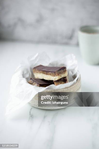 sugar free vegan chocolate sticks with coconut and dates - nougat stock pictures, royalty-free photos & images