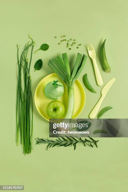 green colour vegan food still life image. - ingredient flatlay stock pictures, royalty-free photos & images