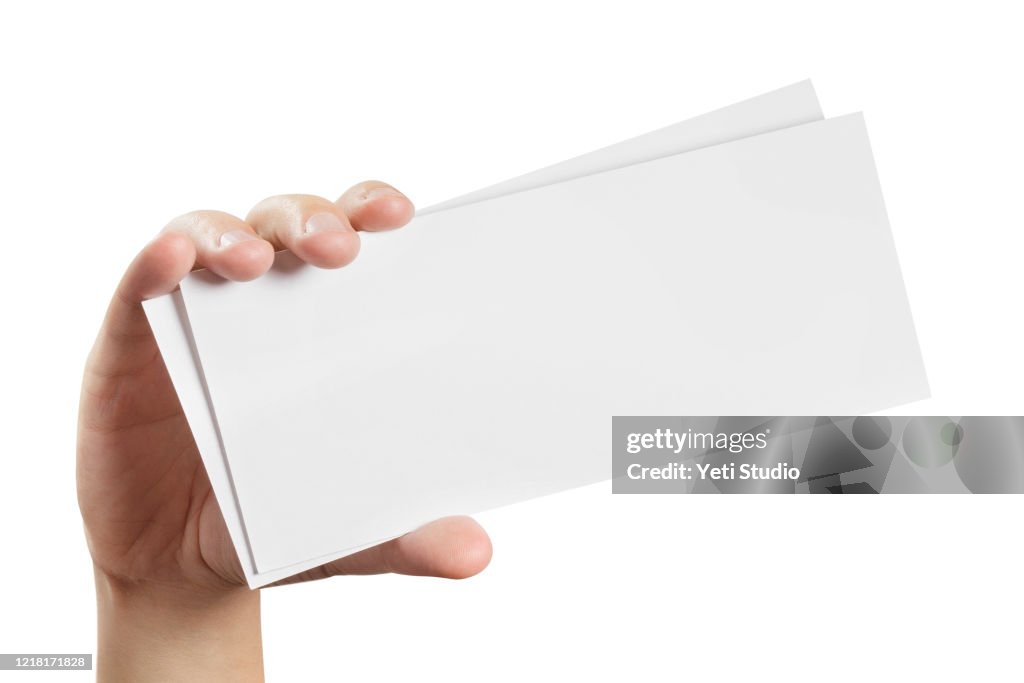 Two empty paper sheets in hand on white