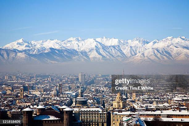 view across snow covered mountains, turin, italy - turijn stockfoto's en -beelden