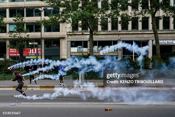 Protesters clashes with Police riots during an anti-racism protest, in Brussels, on June 7 as part of a weekend of 'Black Lives Matter' worldwide...