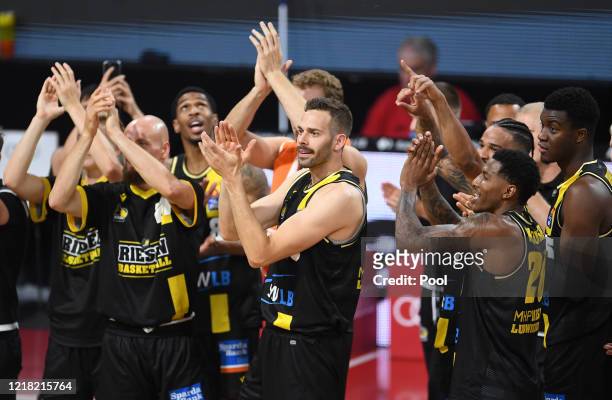 Players of MHP Riesen Ludwigsburg celebrate their victory after the EasyCredit Basketball Bundesliga match between Rasta Vechta and MHP Riesen...