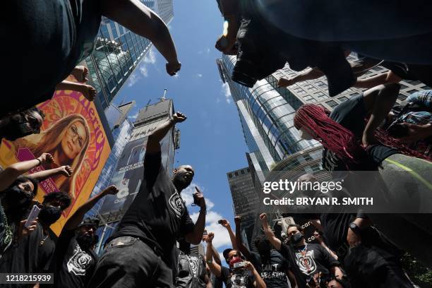 "Black Lives Matter" New York co-founder Hawk Newsome leads protesters during a demonstration in Times Square over the death of George Floyd by a...