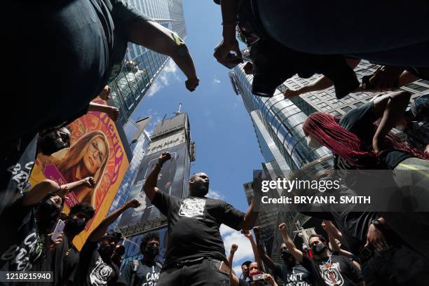 Black Lives Matter" New York co-founder Hawk Newsome leads protesters during a demonstration in Times Square over the death of George Floyd by a...