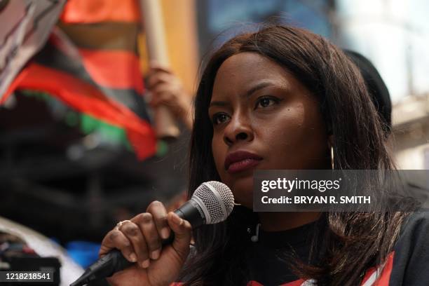 "Black Lives Matter" New York co-founder Chivona Newsome leads protesters as they demonstrate in Times Square over the death of George Floyd by a...