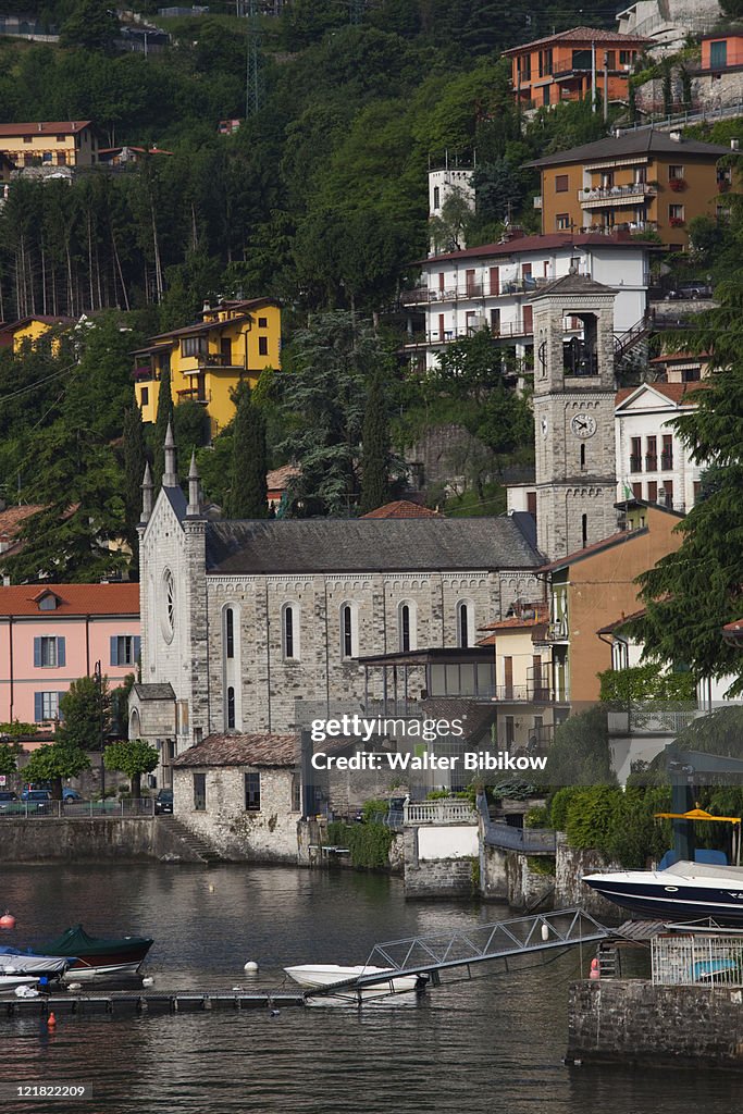 Lake view with town church, Argegno, Lake Como, Lakes Region, Milan, Lombardy, Italy