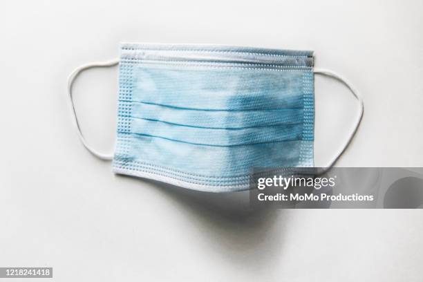 surgical mask on white background - blue surgical mask stock pictures, royalty-free photos & images