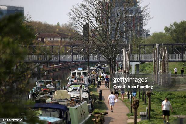 General view as people walk down the canal at Queen Elizabeth Olympic Park on April 11, 2020 in London, England. Public Easter events have been...