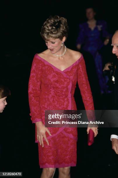 Diana, Princess of Wales attends the 'Joy to the World' Christmas concert at the Royal Albert Hall in London, 17th December 1991. She is wearing a...