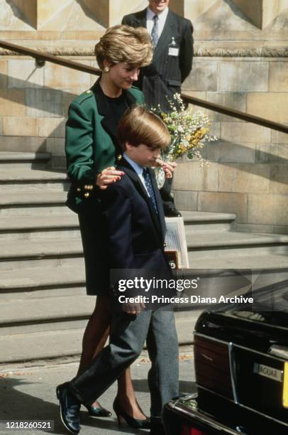 Diana, Princess of Wales and Prince William visit the Natural History Museum in London, April 1992. Diana is wearing a green suit by Moschino.