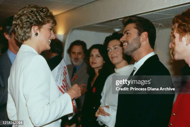 Diana, Princess of Wales meets singer George Michael at Wembley Arena in London, for the Concert of Hope, a benefit concert on World AIDS Day, 2nd...