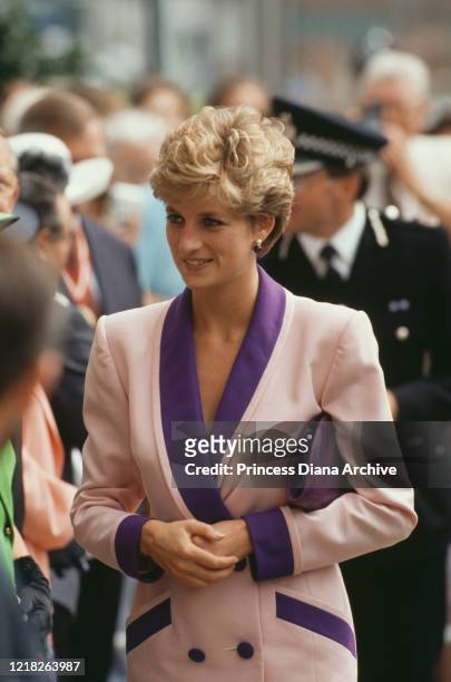 Diana, Princess of Wales during a visit to Hull and Humberside in the north of England, 24th June 1992. She is wearing a pink and purple suit by...