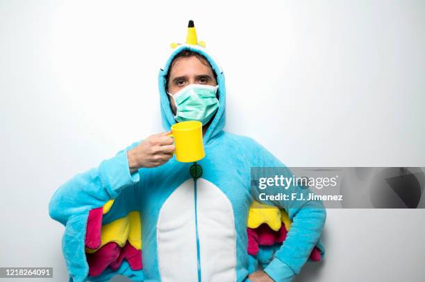 man disguised as chicken and wearing a mask and cup - funny surgical masks stock pictures, royalty-free photos & images