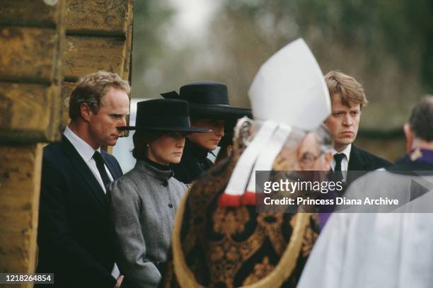 Diana, Princess of Wales at the funeral of her father, the 8th Earl Spencer,at Great Brington Church, England, 1st April 1992. Next to her in grey is...