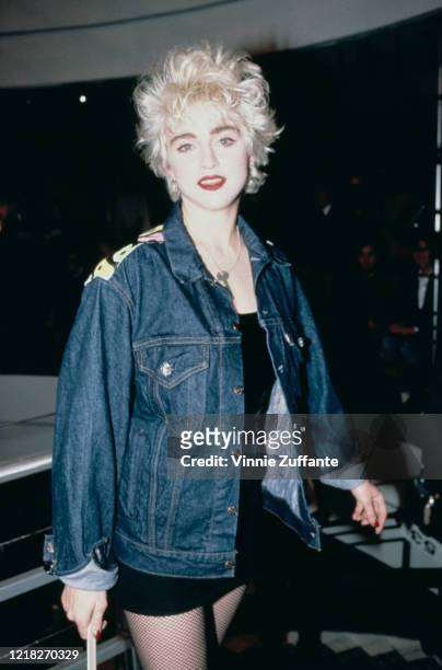 American singer and actress Madonna takes part in a celebrity fashion show at Barneys clothing store in New York City, 10th November 1986. Proceeds...