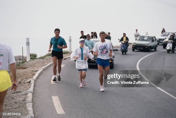 American singer and actress Madonna out jogging on the Riviera, circa 1988.