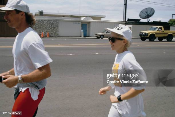 American singer and actress Madonna out jogging, USA, circa 1988.