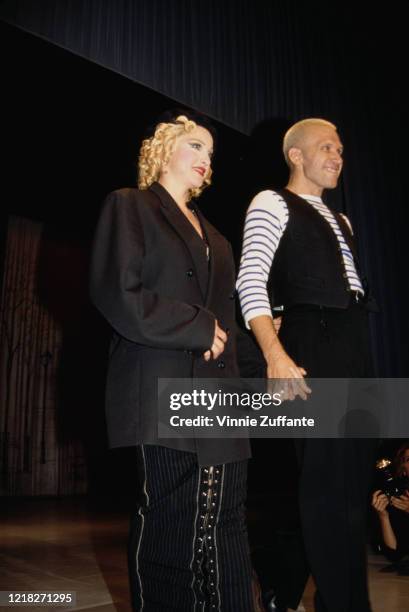 American singer and actress Madonna with French fashion designer Jean-Paul Gaultier at a fashion show in aid of amfAR, the American Foundation for...