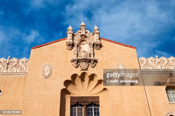 facade of historic lensic performing arts center on west san francisco street in downtown santa fe - performing arts center stock pictures, royalty-free photos & images